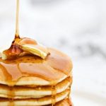 Stock syrup label background #13: Pure Maple Syrup Pouring onto a Stack of Pancakes