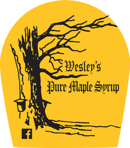 Wesley's Pure Maple Syrup gold label with Facebook icon.